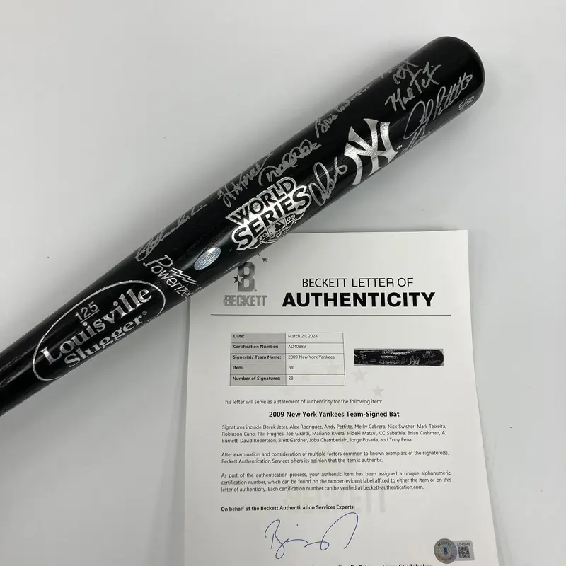 2009 New York Yankees World Series Champs Team Signed Bat #5/50 Beckett COA
