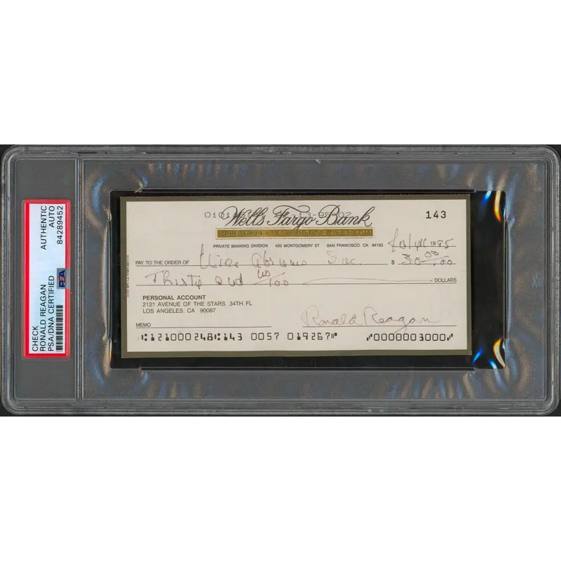 Ronald Reagan Signed 2.75x6 Personal Check Dated July 4, 1995 PSA/DNA Slabbed
